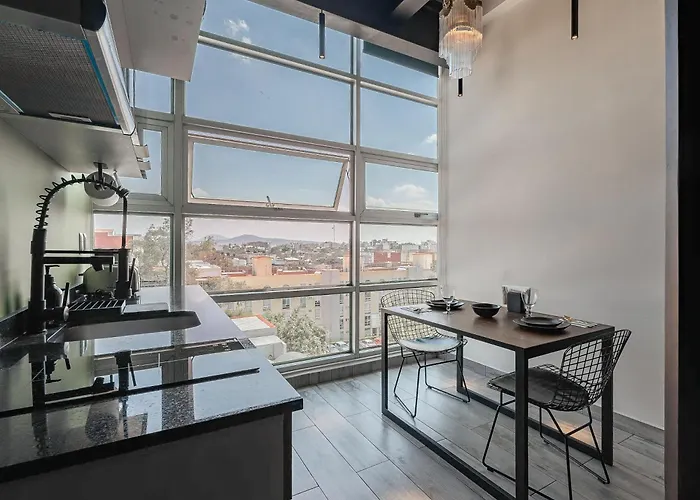 The Jungle Loft Tropical Comfort In A Centric Location With Kitchen